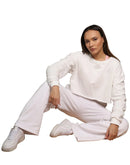 Lounge Set in white, matching sweatpants and cropped sweater
