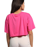 Pink crop top from back